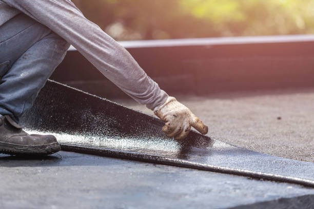 Professional Basement Waterproofing technician working in Paris, IL